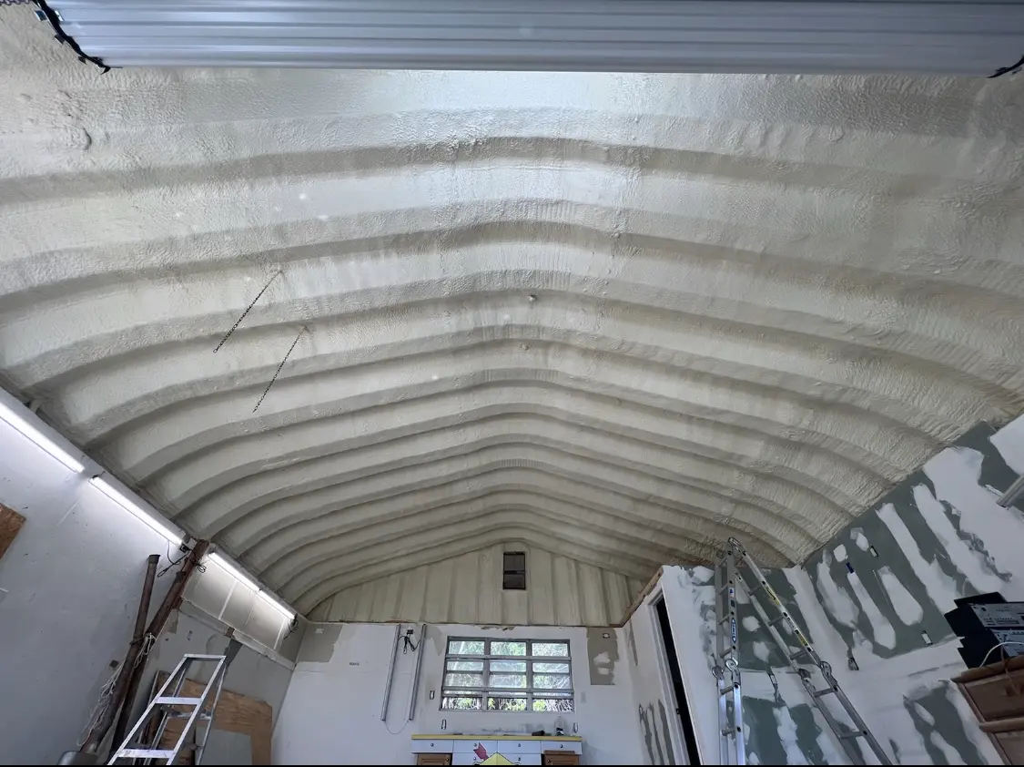 Spray polyurethane foam applied to the underside of a metal roof deck in University of California-Santa Barbara